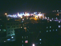 City view of Imam Reza mosque at night